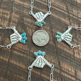 Skelly Hand Necklace (small with light blue)