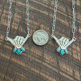 Skelly Hand Necklace (medium with mid-blue)
