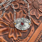 Golden Hour Rodeo Silver Buckle (Garnet Center)