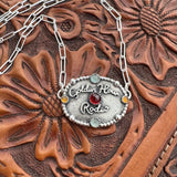 Golden Hour Rodeo Silver Buckle (Garnet Center)