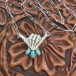 Skelly Hand Necklace (medium with light blue)