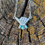 Skelly Hand Necklace (small with light blue)