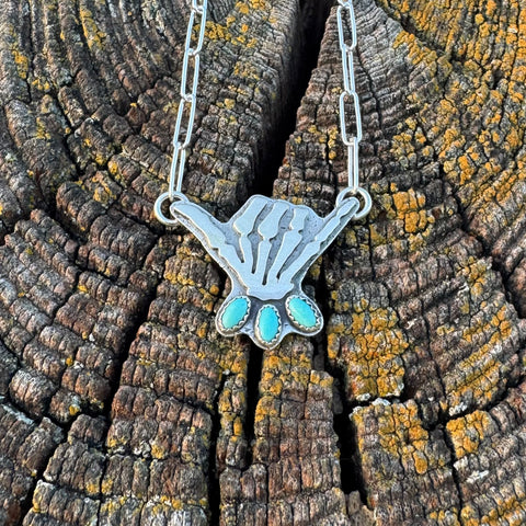 Skelly Hand Necklace (small with light blue)