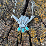 Skelly Hand Necklace (large with bright blue)
