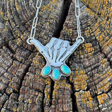 Skelly Hand Necklace (large with bright blue)