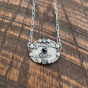 Golden Hour Rodeo Silver Buckle (Sapphire Center)