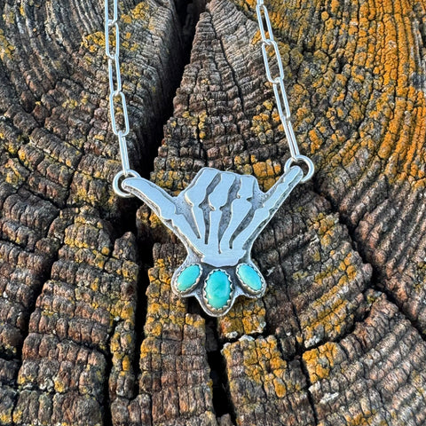 Skelly Hand Necklace (medium with light blue)