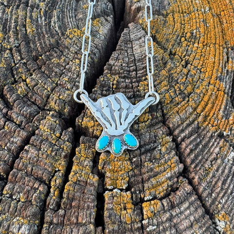 Skelly Hand Necklace (small with bright blue)